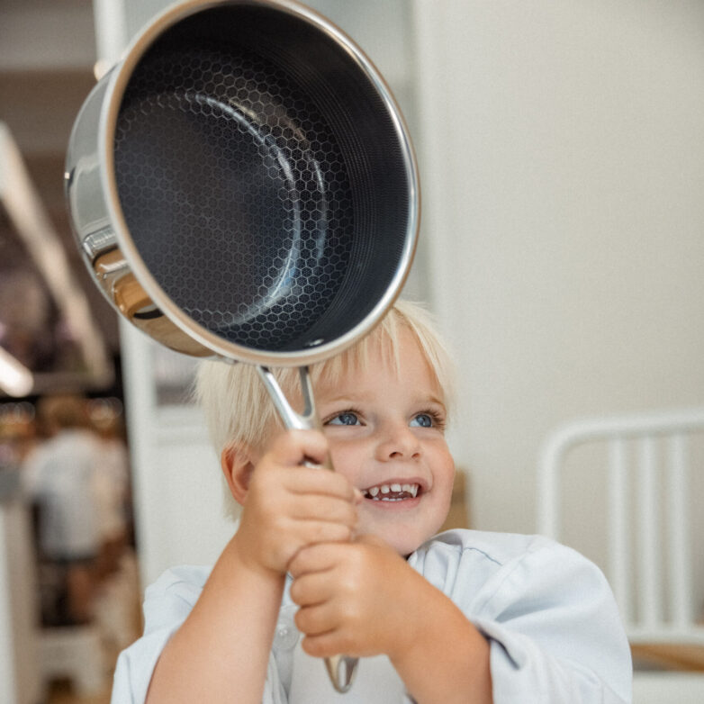LKA Student holding HexClad pan