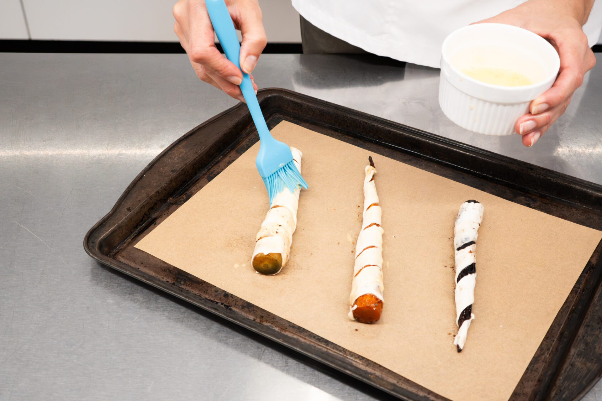 Brush whisked egg over carrots